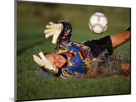 Soccer Goalie in Action-null-Mounted Photographic Print