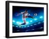 Soccer Player in Action on Night Stadium Background-Eugene Onischenko-Framed Photographic Print