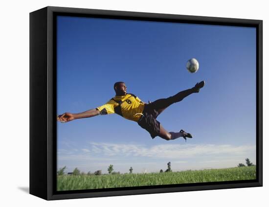 Soccer Player in Action-null-Framed Stretched Canvas