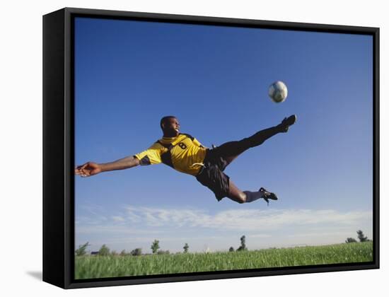 Soccer Player in Action-null-Framed Stretched Canvas