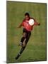 Soccer Player in Action-null-Mounted Photographic Print