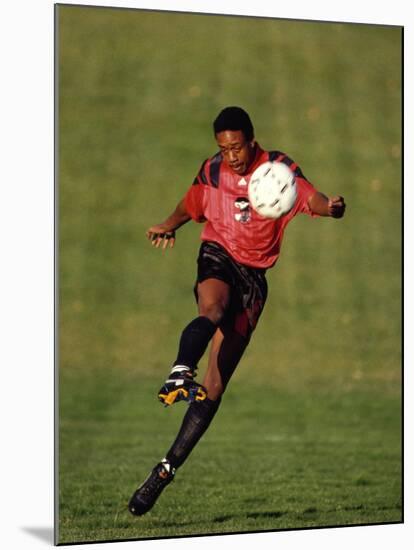 Soccer Player in Action-null-Mounted Photographic Print