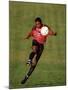 Soccer Player in Action-null-Mounted Photographic Print