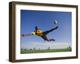 Soccer Player in Action-null-Framed Photographic Print