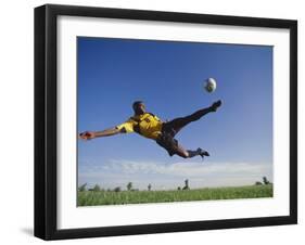 Soccer Player in Action-null-Framed Photographic Print