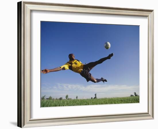 Soccer Player in Action-null-Framed Photographic Print