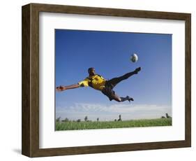 Soccer Player in Action-null-Framed Photographic Print