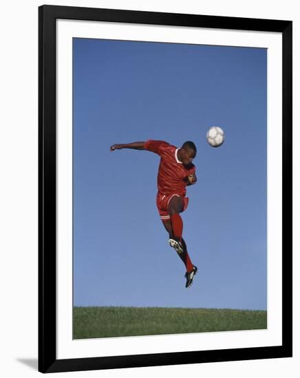 Soccer Player in Action-null-Framed Photographic Print