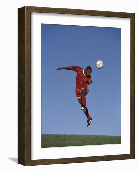 Soccer Player in Action-null-Framed Photographic Print