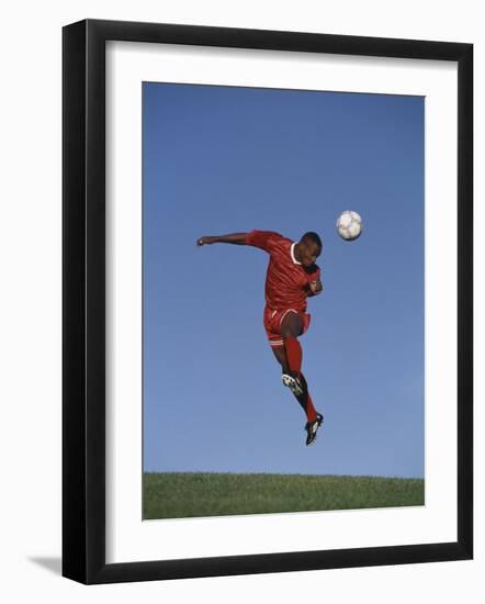 Soccer Player in Action-null-Framed Photographic Print