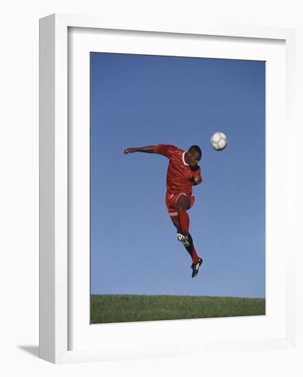 Soccer Player in Action-null-Framed Photographic Print