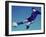 Soccer Player Jumping in Mid Air to Kick a Soccer Ball-null-Framed Premium Photographic Print