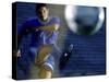 Soccer Player Kicking a Soccer Ball-null-Stretched Canvas