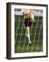 Soccer Player Kicking a Soccer Ball-null-Framed Photographic Print