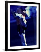 Soccer Player Kicking a Soccer Ball-null-Framed Photographic Print