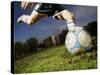 Soccer Player Kicking Ball-Randy Faris-Stretched Canvas