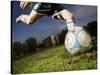 Soccer Player Kicking Ball-Randy Faris-Stretched Canvas