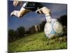 Soccer Player Kicking Ball-Randy Faris-Mounted Premium Photographic Print