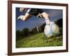 Soccer Player Kicking Ball-Randy Faris-Framed Photographic Print