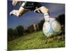 Soccer Player Kicking Ball-Randy Faris-Mounted Photographic Print