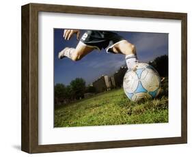 Soccer Player Kicking Ball-Randy Faris-Framed Photographic Print