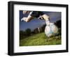 Soccer Player Kicking Ball-Randy Faris-Framed Photographic Print