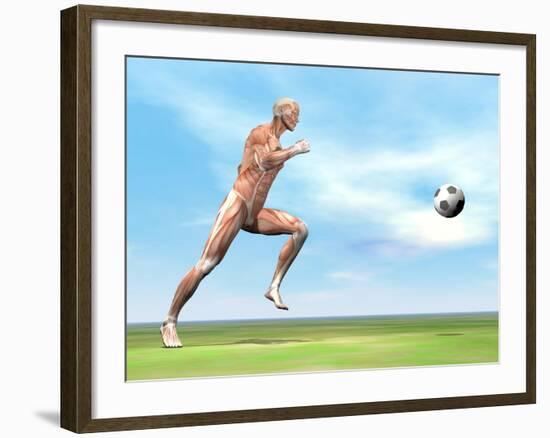 Soccer Player Musculature Running after Soccer Ball-null-Framed Art Print