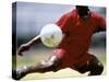 Soccer Player Preparing to Kick Ball-null-Stretched Canvas