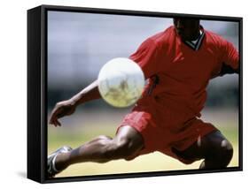 Soccer Player Preparing to Kick Ball-null-Framed Stretched Canvas