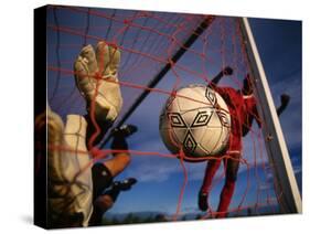 Soccer Player Scoring a Goal-null-Stretched Canvas