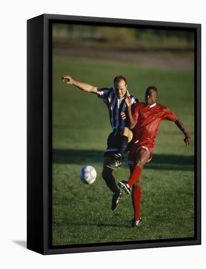 Soccer Players Fighting for the Ball-null-Framed Stretched Canvas