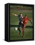 Soccer Players Fighting for the Ball-null-Framed Stretched Canvas