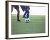 Soccer players from opposing teams compete for the ball during a game-null-Framed Photographic Print