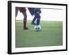Soccer players from opposing teams compete for the ball during a game-null-Framed Photographic Print