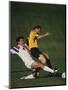 Soccer Players in Action-null-Mounted Premium Photographic Print