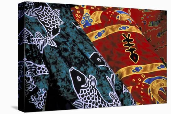 Society Islands, French Polynesia, Close-up of nautical designs on batik at a market.-Todd Gipstein-Stretched Canvas