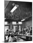 Soda Fountain Proprietor Watching as Kids Use Drinking Straw Covers as Straw Blowgun Missiles-Wallace Kirkland-Mounted Photographic Print