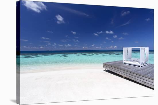 Sofa at the Beach in the Maldives, Indian Ocean-Sakis Papadopoulos-Stretched Canvas