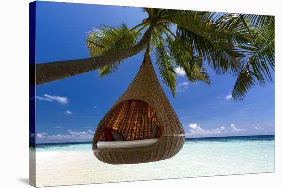 Sofa Hanging on a Tree on the Beach, Maldives, Indian Ocean-Sakis Papadopoulos-Stretched Canvas