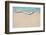 Soft Wave of Blue Ocean on Sandy Beach. Background. Selective Focus.-Lidiya Oleandra-Framed Photographic Print
