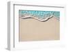 Soft Wave of Blue Ocean on Sandy Beach. Background. Selective Focus.-Lidiya Oleandra-Framed Photographic Print