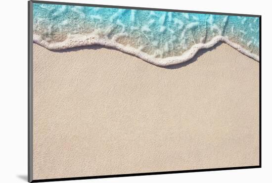 Soft Wave of Blue Ocean on Sandy Beach. Background. Selective Focus.-Lidiya Oleandra-Mounted Photographic Print