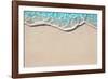 Soft Wave of Blue Ocean on Sandy Beach. Background. Selective Focus.-Lidiya Oleandra-Framed Photographic Print
