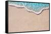 Soft Wave of Blue Ocean on Sandy Beach. Background.-Lidiya Oleandra-Framed Stretched Canvas