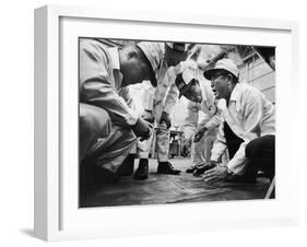 Soichiro Honda Showing Engineers Solution to Body Noise Problem at Research Facility, Japan, 1967-Takeyoshi Tanuma-Framed Photographic Print