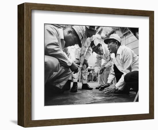 Soichiro Honda Showing Engineers Solution to Body Noise Problem at Research Facility, Japan, 1967-Takeyoshi Tanuma-Framed Photographic Print