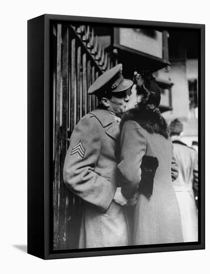 Soldier Giving a Farewell Kiss to His Lady Friend at Penn Station before Shipping Out-Alfred Eisenstaedt-Framed Stretched Canvas