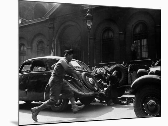 Soldier of Le Clerc's Free French Troops Dashes to Aid French Resistance Fighter-Ralph Morse-Mounted Photographic Print