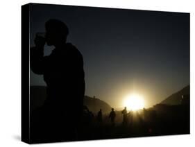 Soldier of the Afghan National Army Drinks Tea at Sunset in Kabul, Afghanistan-null-Stretched Canvas