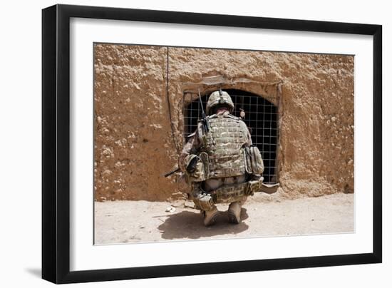 Soldier Searches a Compound in Afghanistan-null-Framed Photographic Print